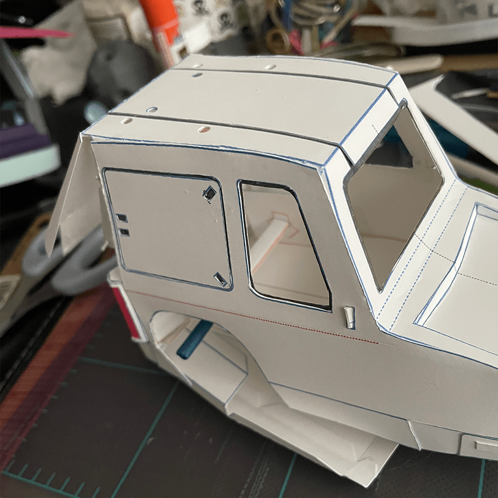 A more complex plain white iteration with visible structure for engine connection