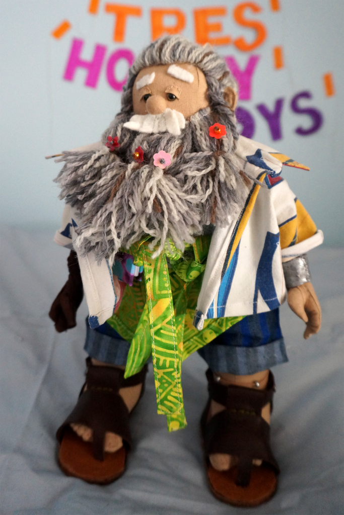 Merle's outfit, from the surfboard shirt to the open-toe sandals